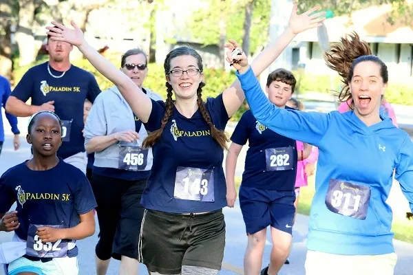 Runners at the Paladin 5k enjoy the event.