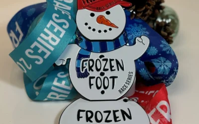 Interlocking Snowmen Series of Race Medals for the Frozen Foot Race Series.