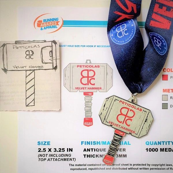 From simple sketch, to art proof, to finished medal.