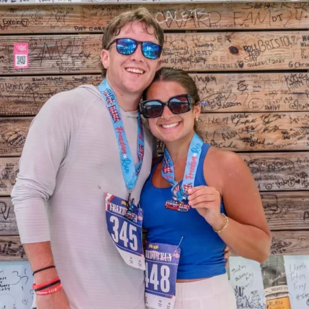 Finishers and Their Race Medals at the Florabama Freedom Run 5K