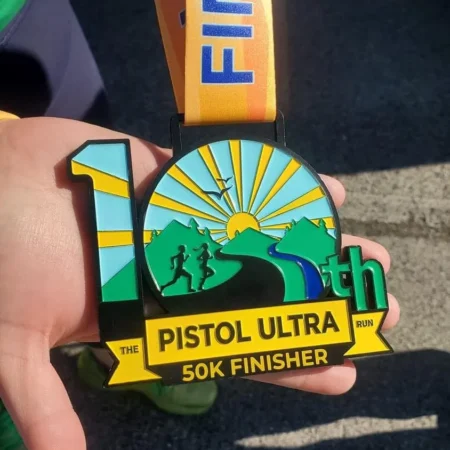 Black Dye Race Medal with Feed Through Ribbon for the Pistol 50K Ultra