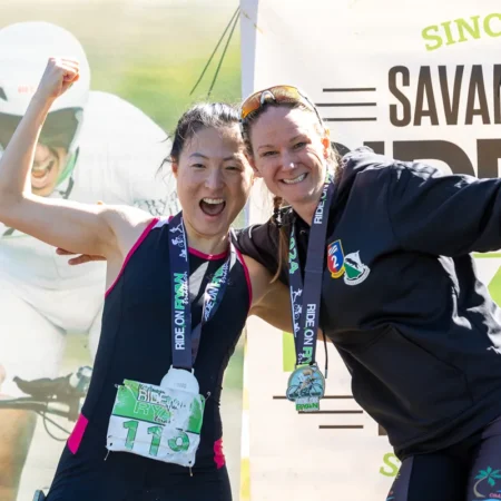 Finishers Celebrate Their Medals at the Ride On Ryan Memorial Triathlon